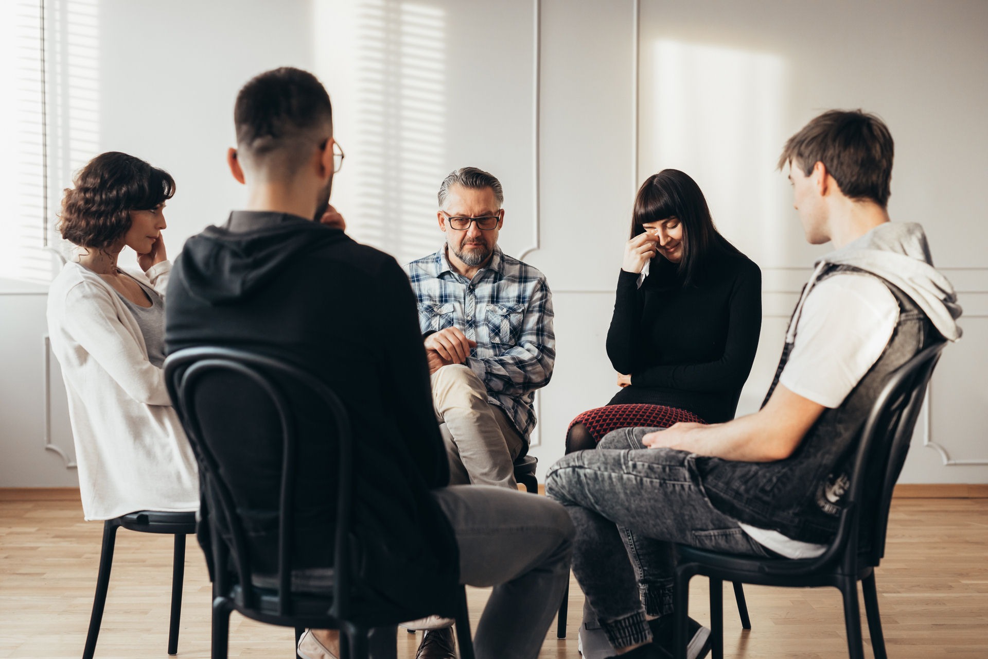 Family in intervention planning meeting with professional